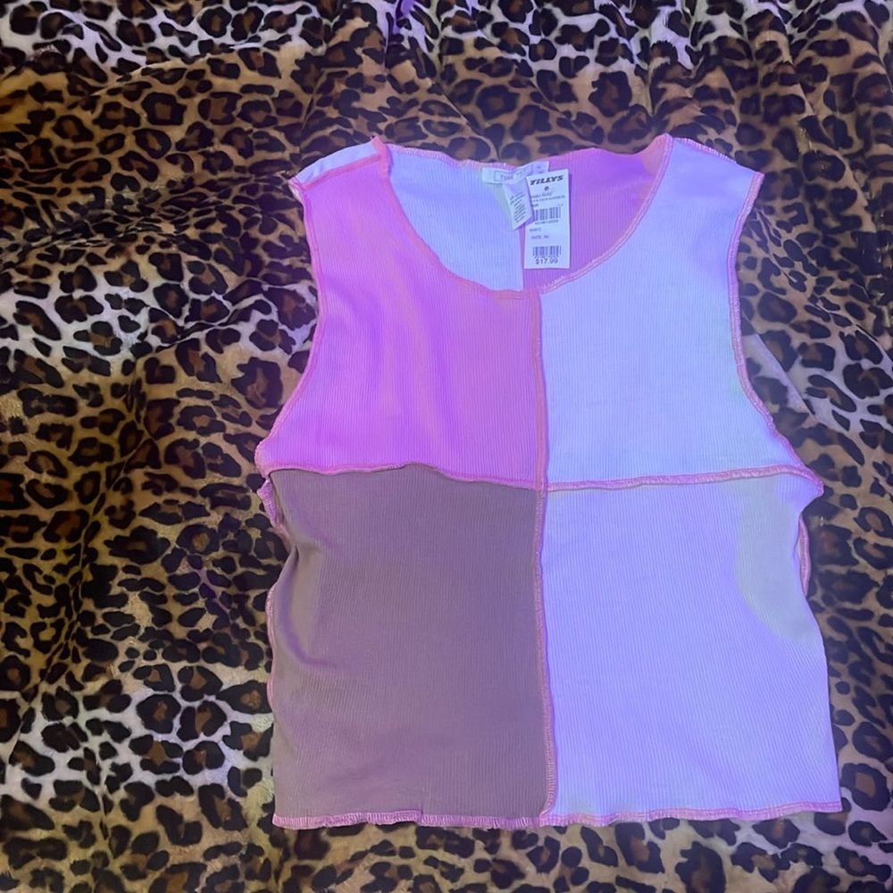 Tilly’s colorful tank top.